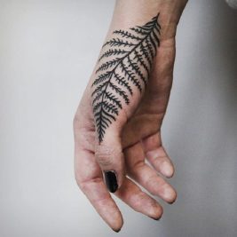 female hand tattoos - hand tattoos for girls - flower hand tattoos