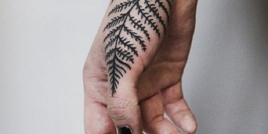 female hand tattoos - hand tattoos for girls - flower hand tattoos